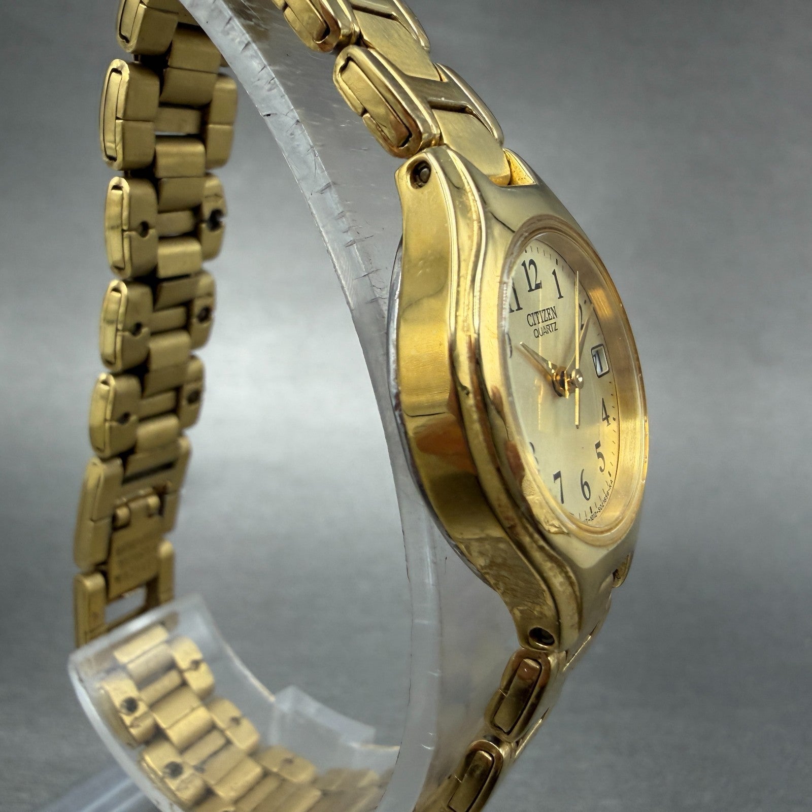 Citizen Watch Women 23mm Champagne Dial Gold Tone Round Date 1012-S072689 NewBat3