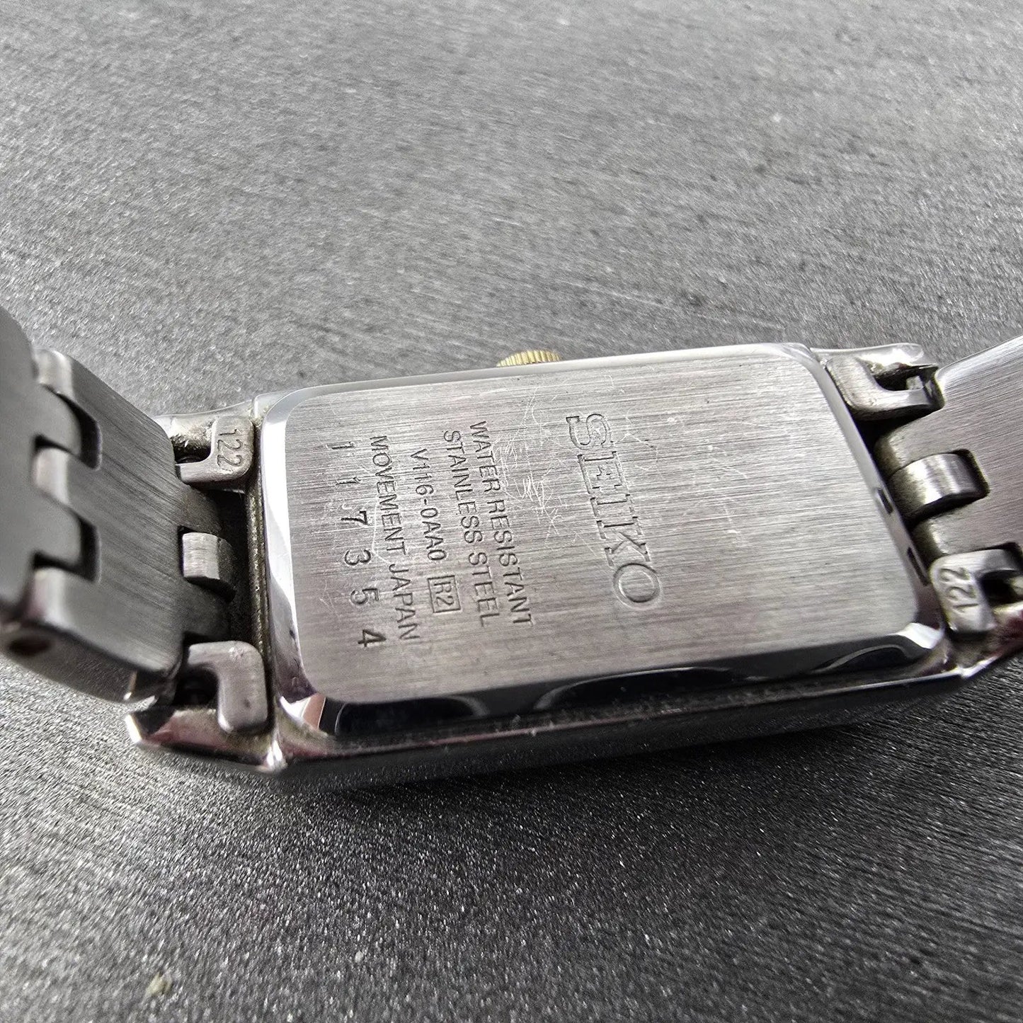Seiko Solar Tank Watch Women 15mm White Dial Two Tone Rectangle V116-0AA0 WorksL9