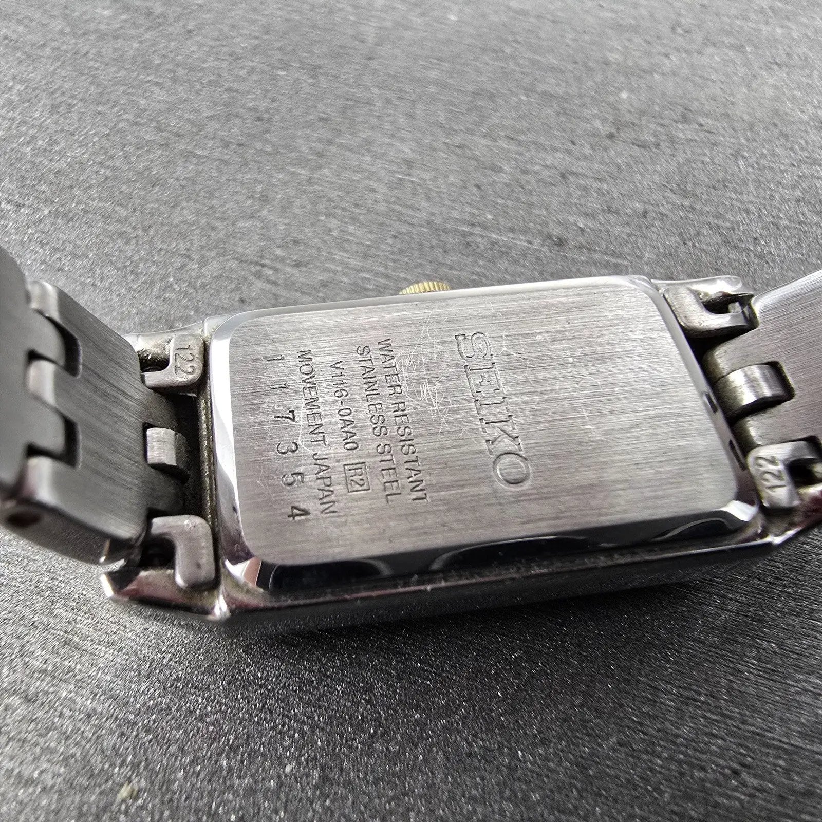 Seiko Solar Tank Watch Women 15mm White Dial Two Tone Rectangle V116-0AA0 WorksL9
