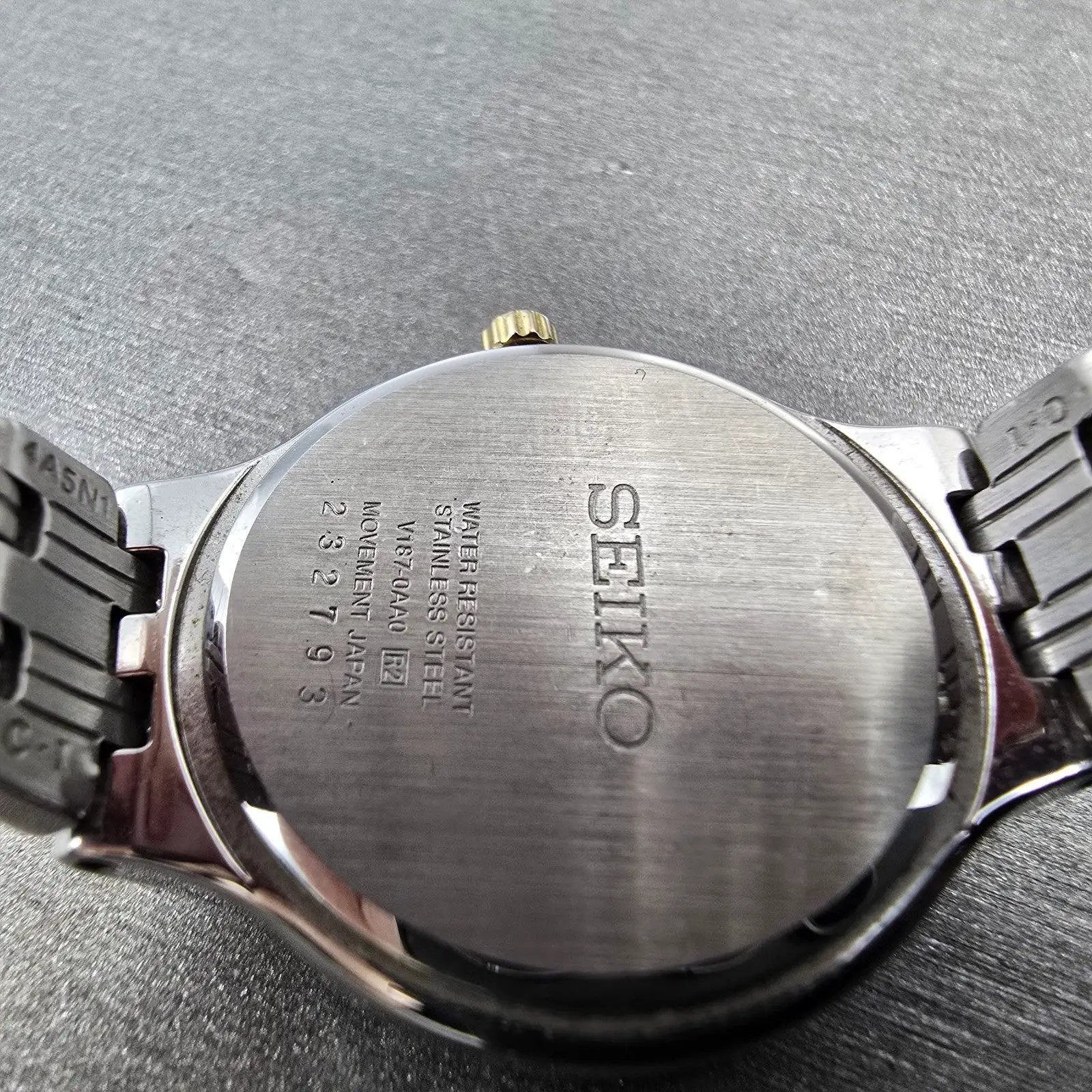 Seiko Solar Watch Women 28mm White Dial Two Tone Date Round V187-0AA0 Runs9