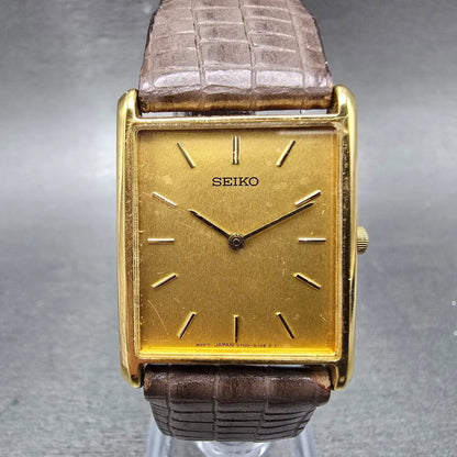 Seiko Tank Watch Men 25mm Champagne Dial Gold Tone Rectangle V700-5K30 New Batt0