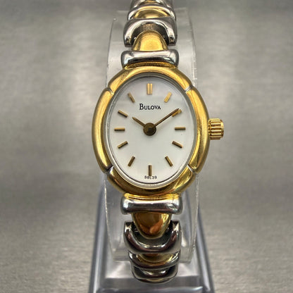 Bulova Watch Women 17mm White Dial Two Tone Oval 98L39 New Battery0
