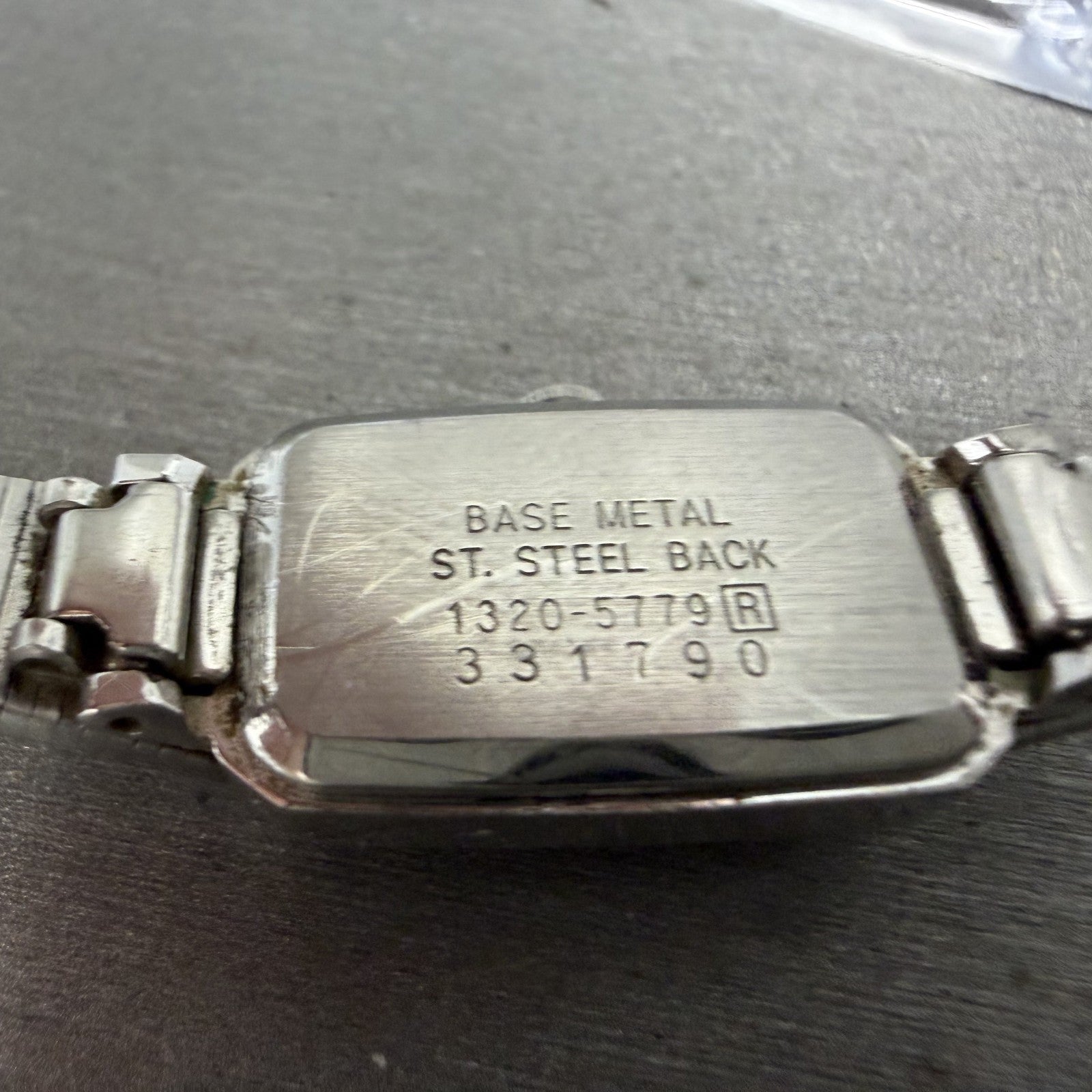 Seiko Watch Women 13mm Silver Dial Silver Tone Rectangle 1320-5779 New Battery9