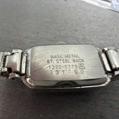 Seiko Watch Women 13mm Silver Dial Silver Tone Rectangle 1320-5779 New Battery9