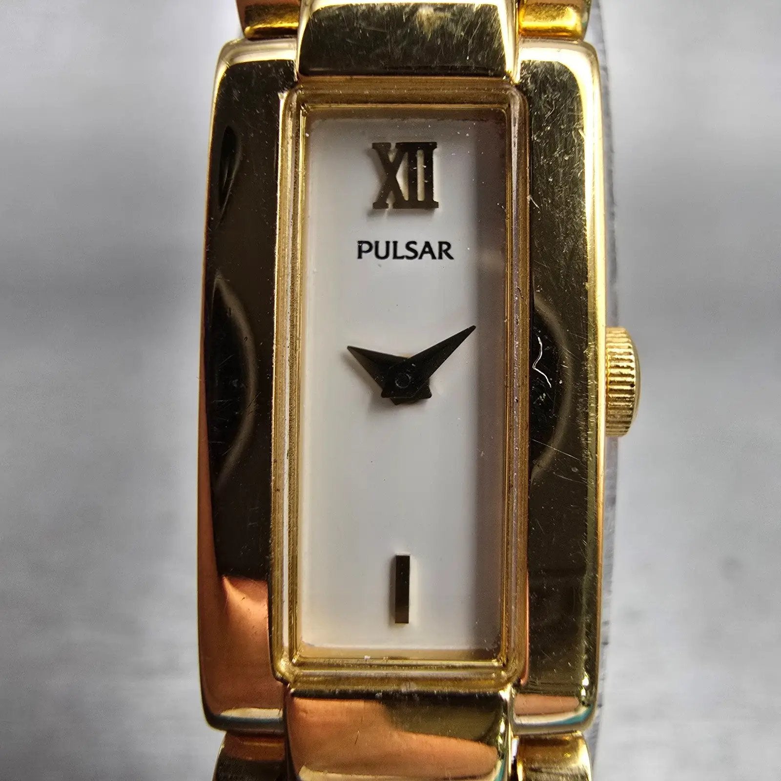 Seiko Pulsar Watch Women 12mm White Dial Gold Tone Rectangle V220-X012 New Batt1