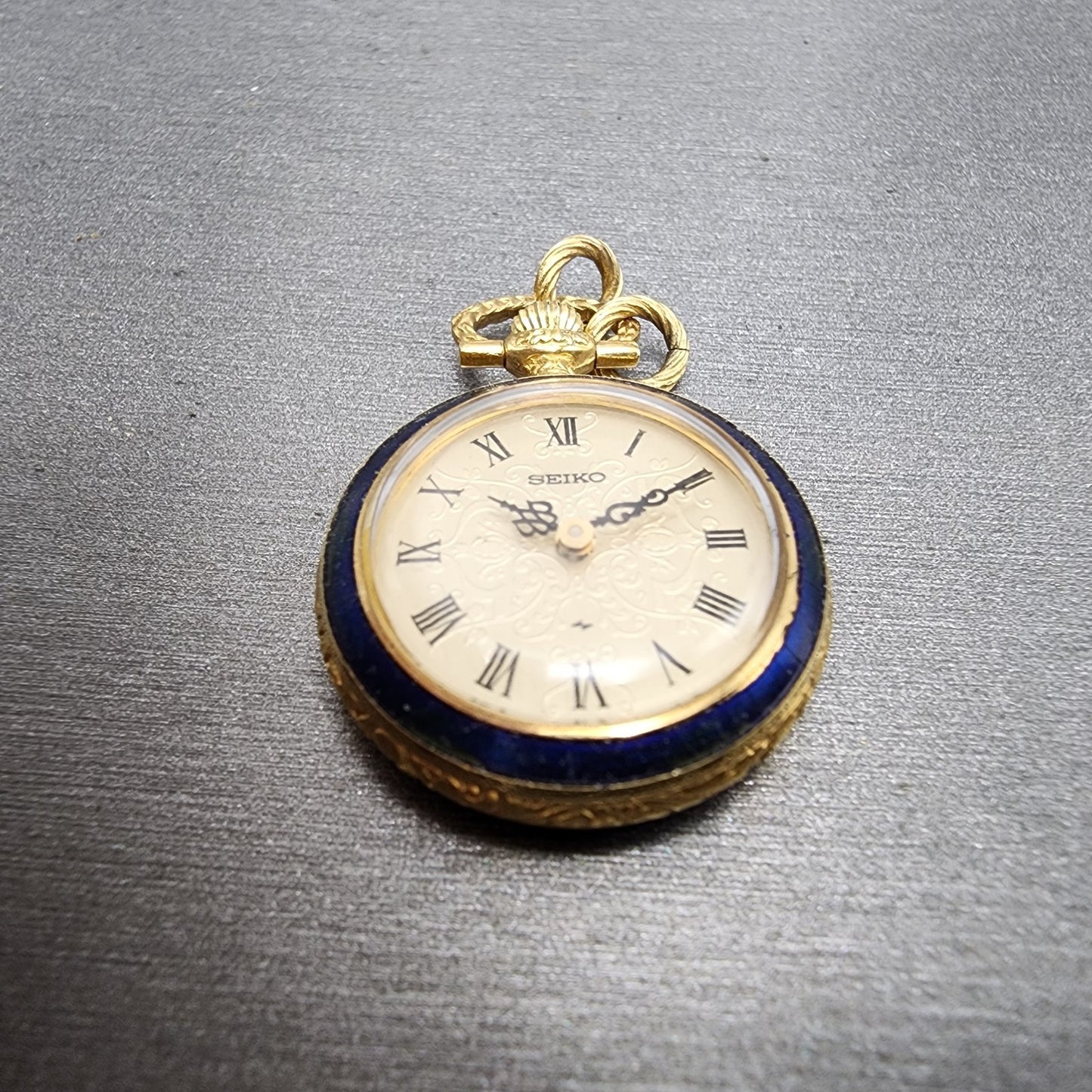Seiko Pendent Watch Women 23mm Champagne Dial Gold & Blue Tone Manual Runs2