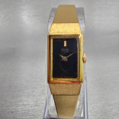 Seiko Watch Women 12mm Black Dial Gold Tone Rectangle 2E20-5490 New Battery VTG0