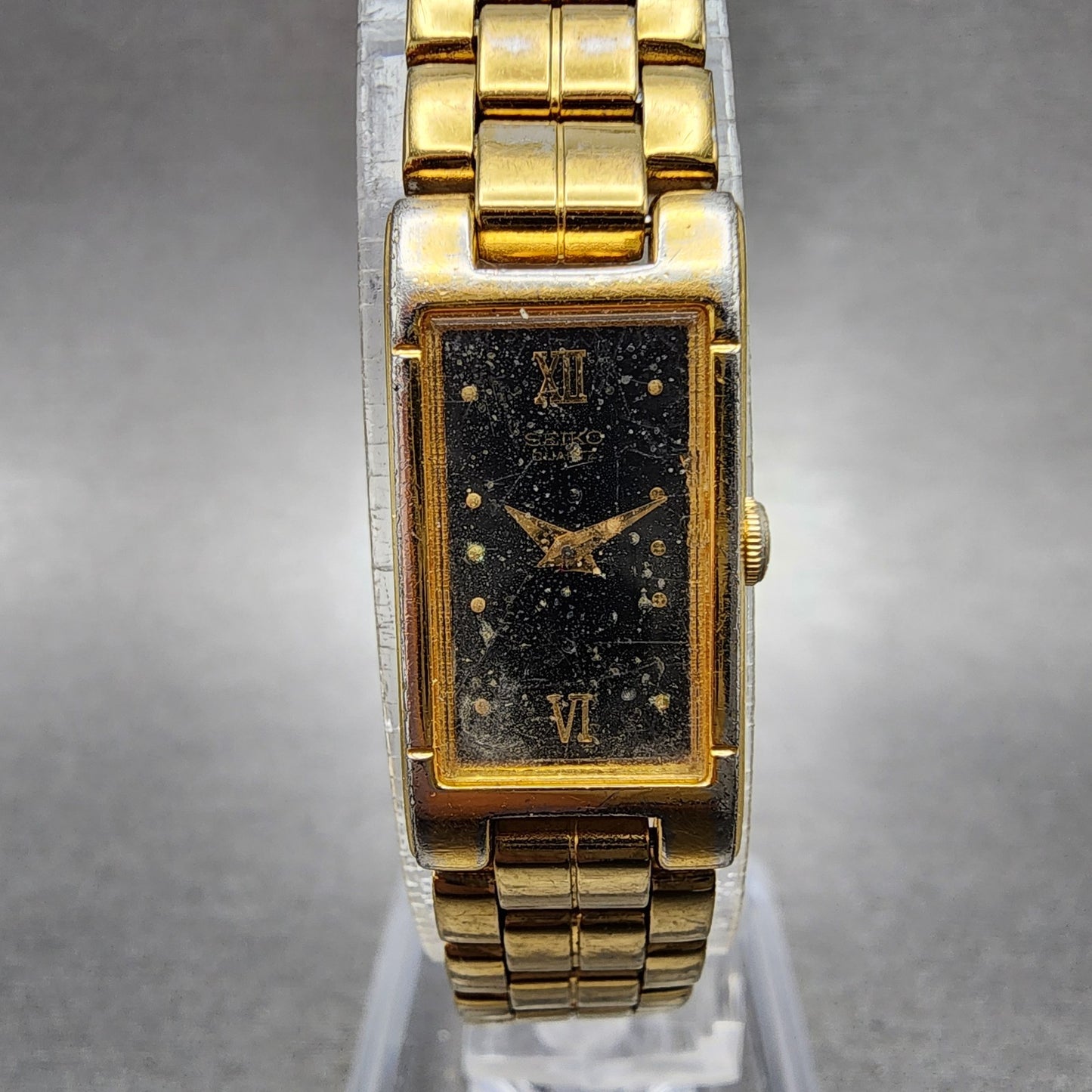 Seiko Tank Watch Women 13mm Black Dial Gold Tone 2e206590 New Battery0