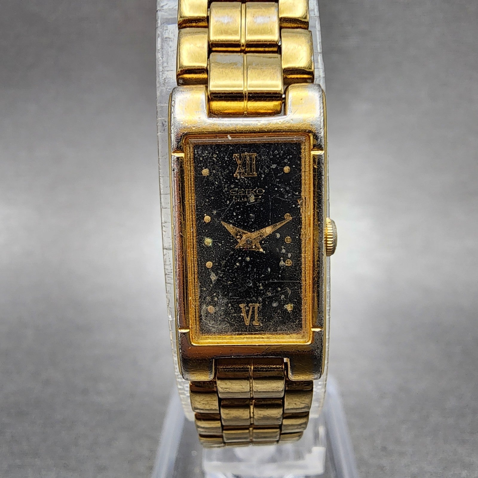 Seiko Tank Watch Women 13mm Black Dial Gold Tone 2e206590 New Battery0