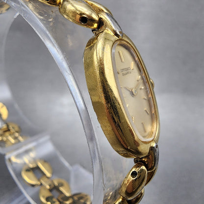 Seiko Watch Women 13mm Champagne Dial Gold Tone Oval 2e206160 New Battery3