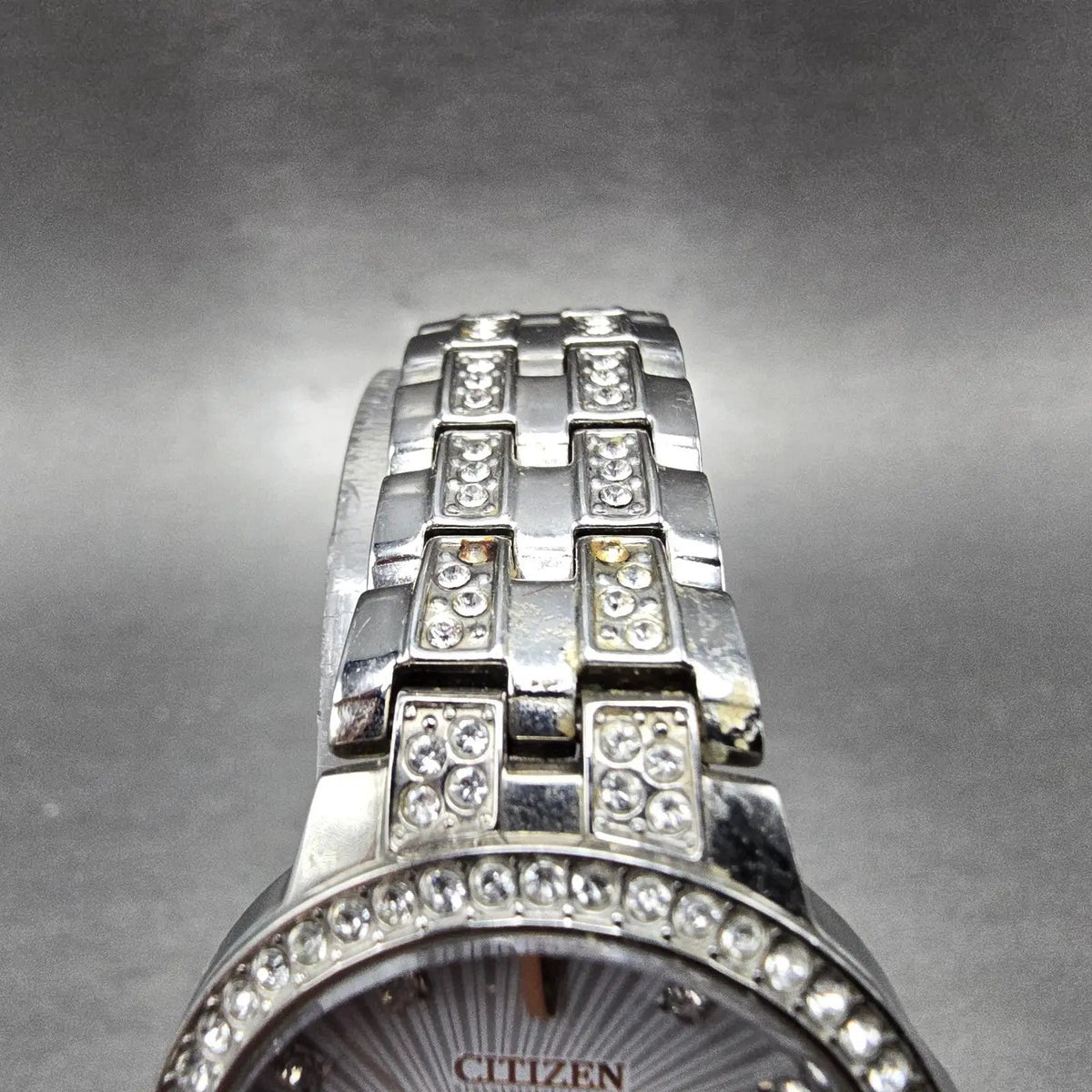 Eco-Drive Silhouette Crystal Watch Women 28mm White Dial Silver Date EW2340-58A4