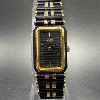 Seiko Tank Watch Women 14mm Black Dial Black & Gold Tone 2E20-5370 New Battery0