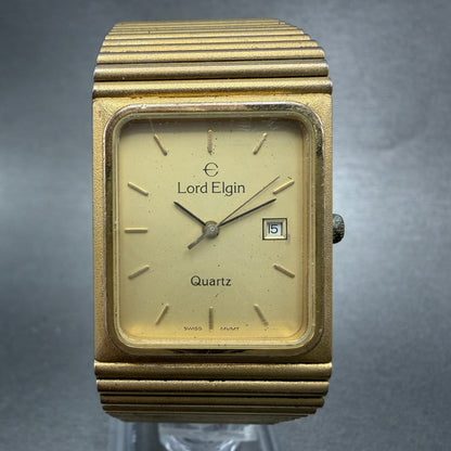 Lord Elgin Tank Watch Men 25mm Champagne Dial Gold Tone Date Rectangle New Batt0