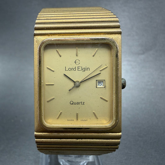 Lord Elgin Tank Watch Men 25mm Champagne Dial Gold Tone Date Rectangle New Batt0