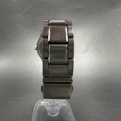 Seiko Alba Solar Watch Men 36mm Silver Dial Silver Tone Daydate V158-0AX0 Runs7