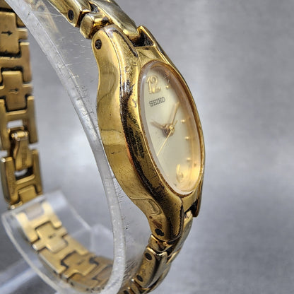 Seiko Watch Women 17mm Champagne Dial Gold Tone Oval 1N010CS0 New Battery3
