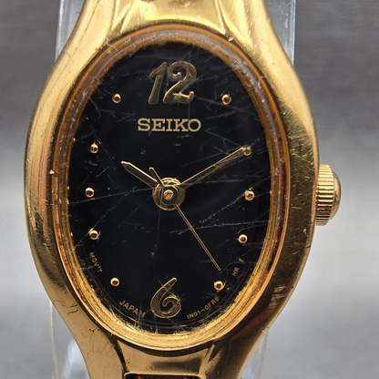 Seiko Watch Women 16mm Black Dial Gold Tone Oval 1N01-0CS0 New Battery Vintage D1