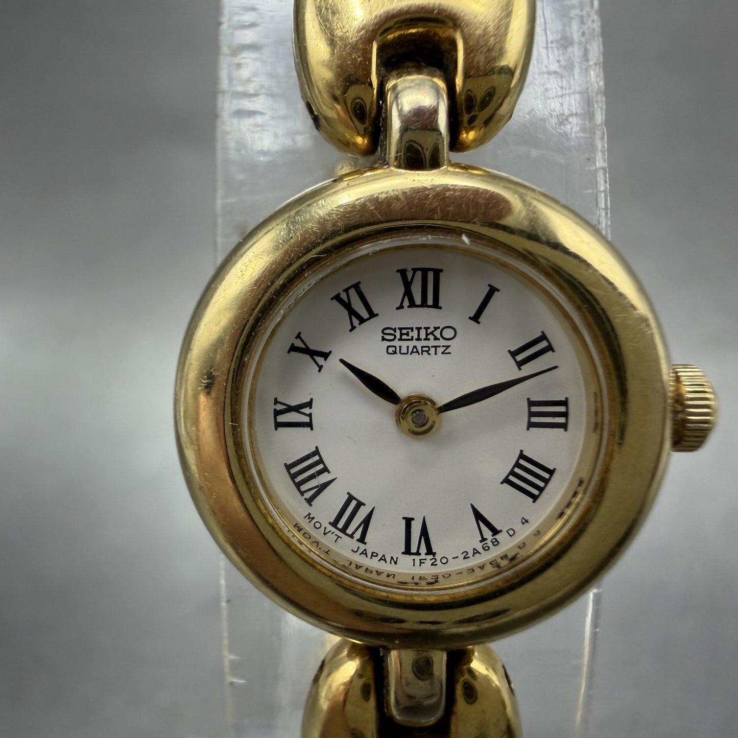 Seiko Watch Women 17mm White Dial Gold Tone Round 1F200H20 New Battery1