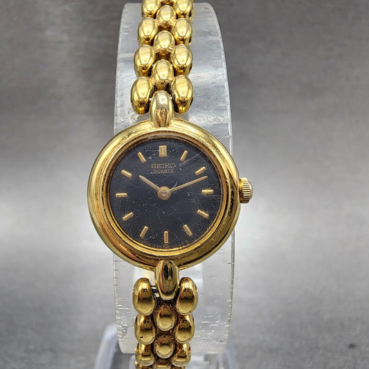 Seiko Watch Women 18mm Black Dial Gold Tone Round 1F200A29 New Battery VTG0