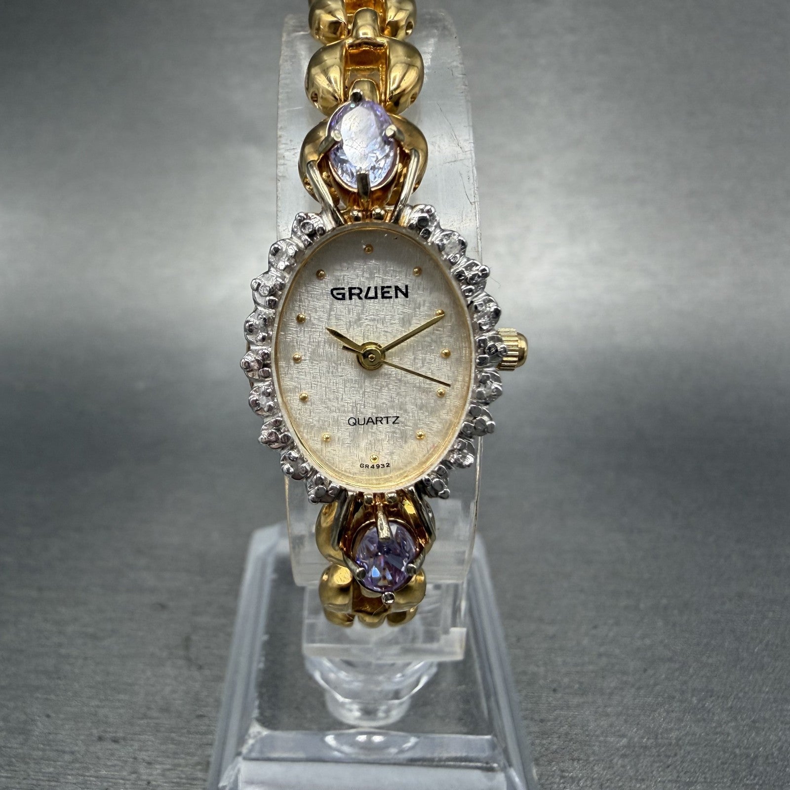 Gruen Watch Women 18mm White Dial Gold Tone Oval Pink Gem Stones New Battery ABC0