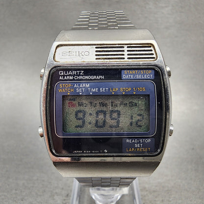 Seiko Digital Watch Men 34mm LCD Silver Tone Alarm Chrono A1594000 READ New Bat0