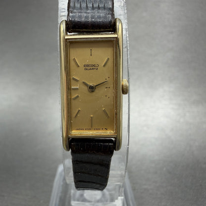 Seiko Tank Watch Women 12mm Champagne Dial Gold Tone 2E205239 New Battery0