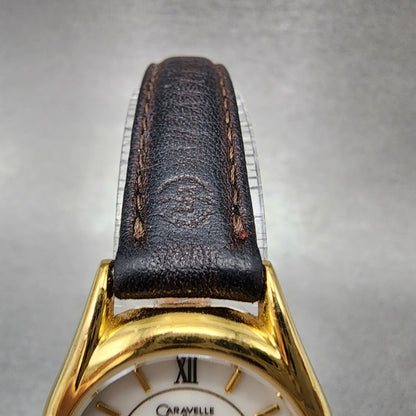 Bulova Caravelle Watch Women 24mm White Dial Gold Tone Round 48E69 New Battery4