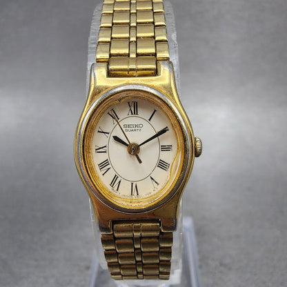 Seiko Watch Women 18mm White Dial Gold Tone Oval V4015109 New Battery VTG0