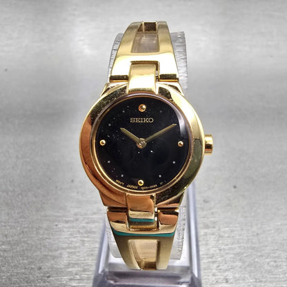 Seiko Watch Women 20mm Black Dial Gold Tone Round 1N00-0GM0 New Battery Vintage0