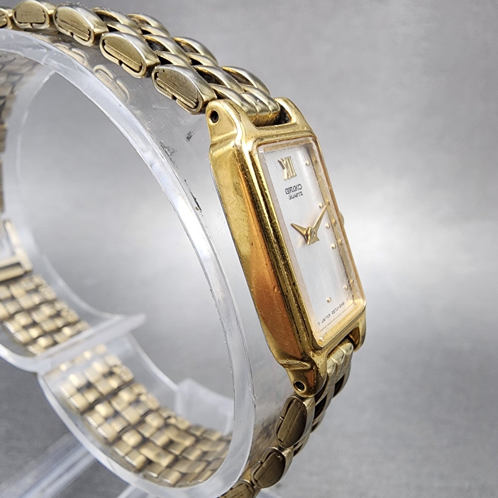 Seiko Tank Watch Women 13mm Silver Tone Gold Tone Rectangle 2e206859 NewBattery3