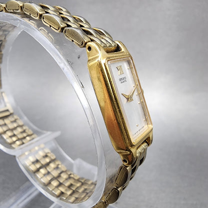 Seiko Tank Watch Women 13mm Silver Tone Gold Tone Rectangle 2e206859 NewBattery3