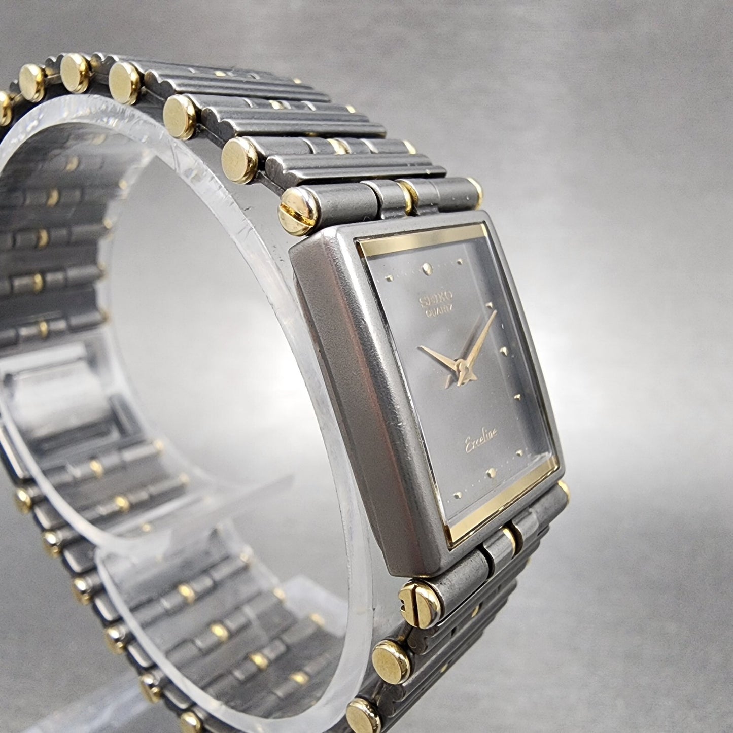 Seiko Exceline Tank Watch Women 18mm Gray Dial Two Tone Rectangle Titanium Runs3