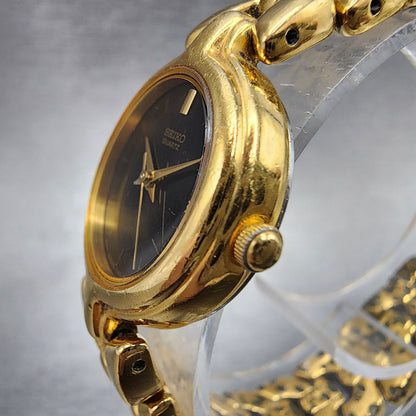 Seiko Watch Women 23mm Black Dial Gold Tone Date Round 7N820248 New Battery2