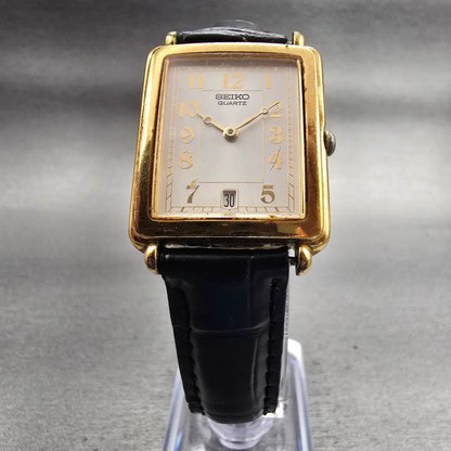 Seiko Tank Watch Men 26mm Silver Dial Gold Tone Date Rectangle 7N29-5B99 New Bat5
