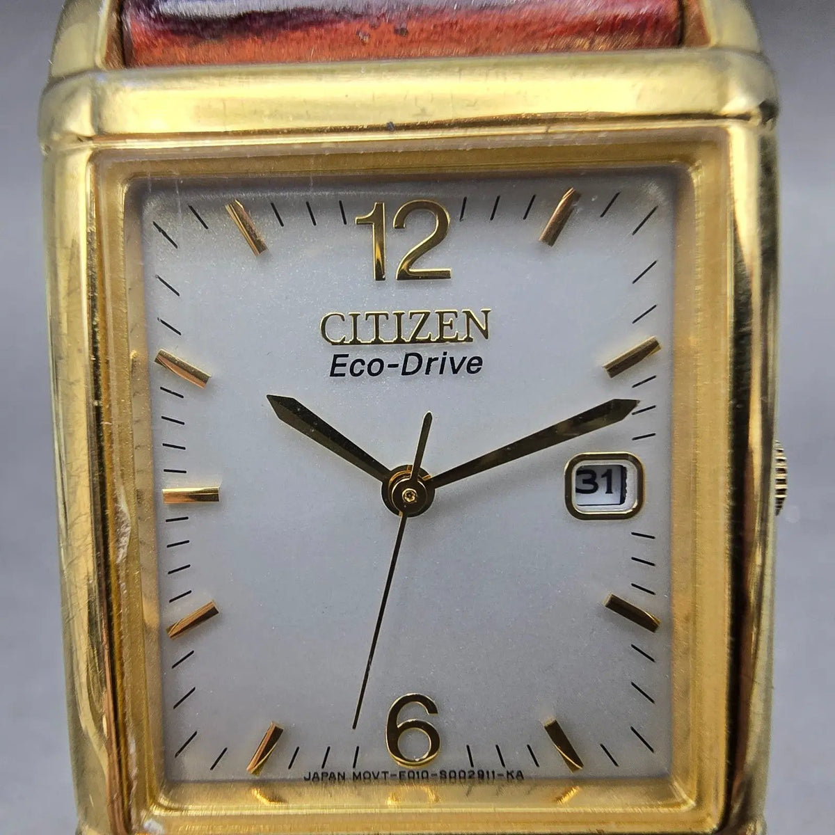 Citizen Eco-Drive Tank Watch Men 25mm White Dial Gold Tone Date Rectangle Runs1