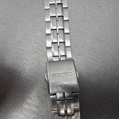 Seiko Solar Watch Men 38mm Black Dial Silver Tone Date READ!!!!!! V157-0AG0 Runs8
