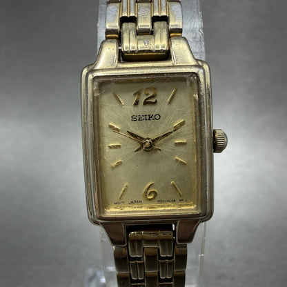 Seiko Tank Watch Women 16mm Champagne Dial Gold Tone Rectangle 1N010FH0 New Bat0