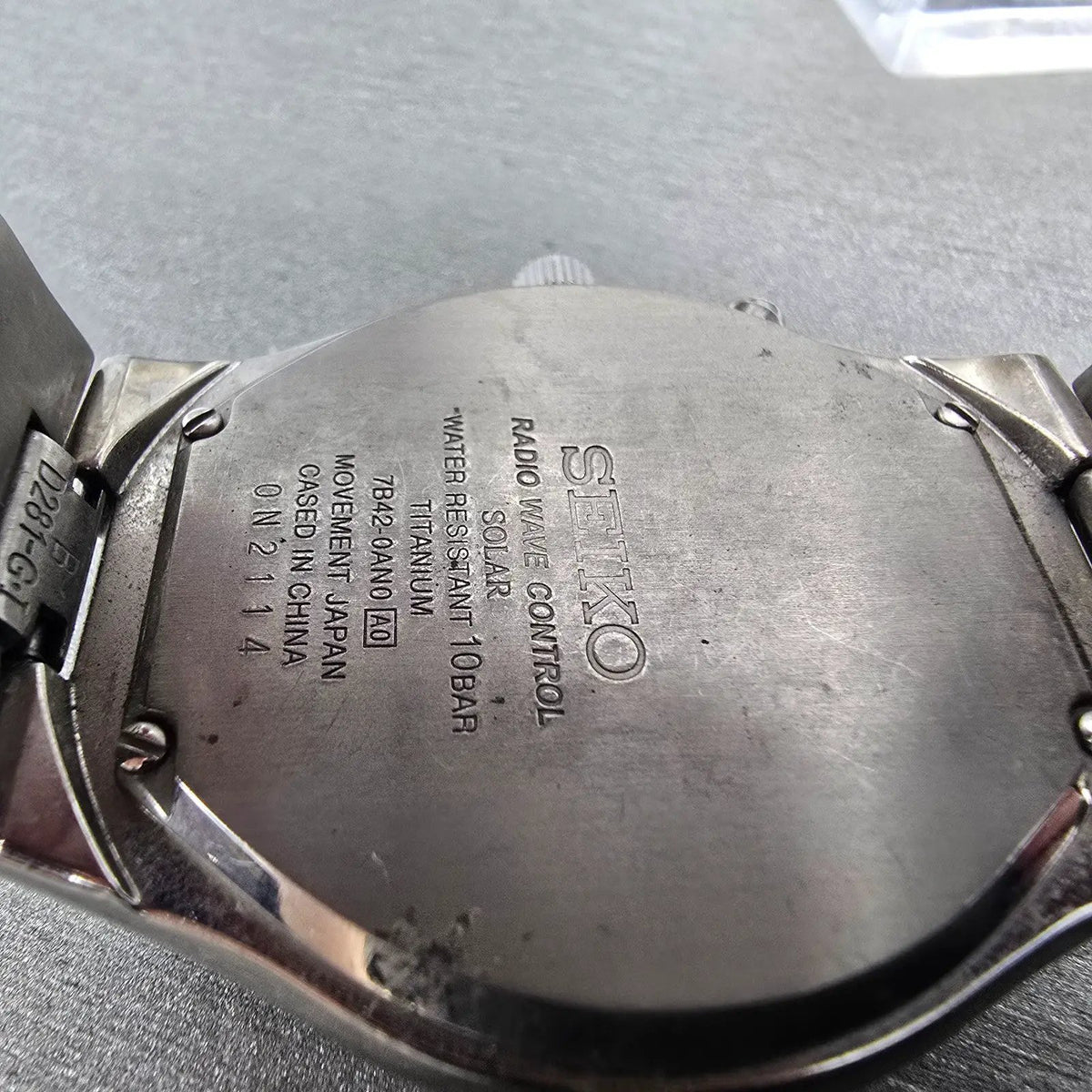 Seiko Atomic Solar Watch Men 39mm Black Dial Titanium Date 7B42-0AN0 Runs JDM9