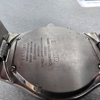 Seiko Atomic Solar Watch Men 39mm Black Dial Titanium Date 7B42-0AN0 Runs JDM9