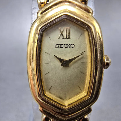 Seiko Watch Women 15mm Champagne Dial Gold Tone Oval Y150-5M89 New Battery VTG1