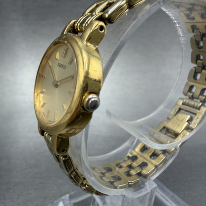 Seiko Watch Women 21mm Champagne Dial Gold Tone Round 1N00-1E09 New Battery LPU2