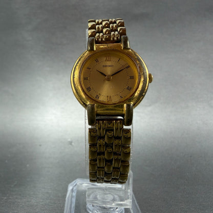 Seiko Watch Women 24mm Champagne Dial Gold Tone Round V701-1781 New Battery5