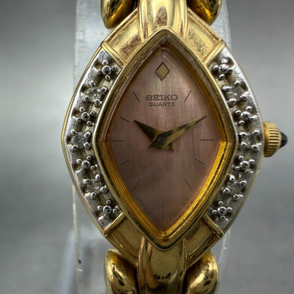 Seiko Watch Women 16mm Pink Dial Gold Tone Vintage 2E20-7059 New Battery1