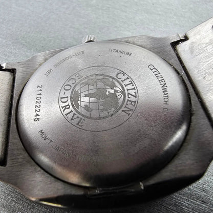 Citizen Eco-Drive Watch Men 38mm Black Dial Titanium Date E111-S049610 Runs JP9