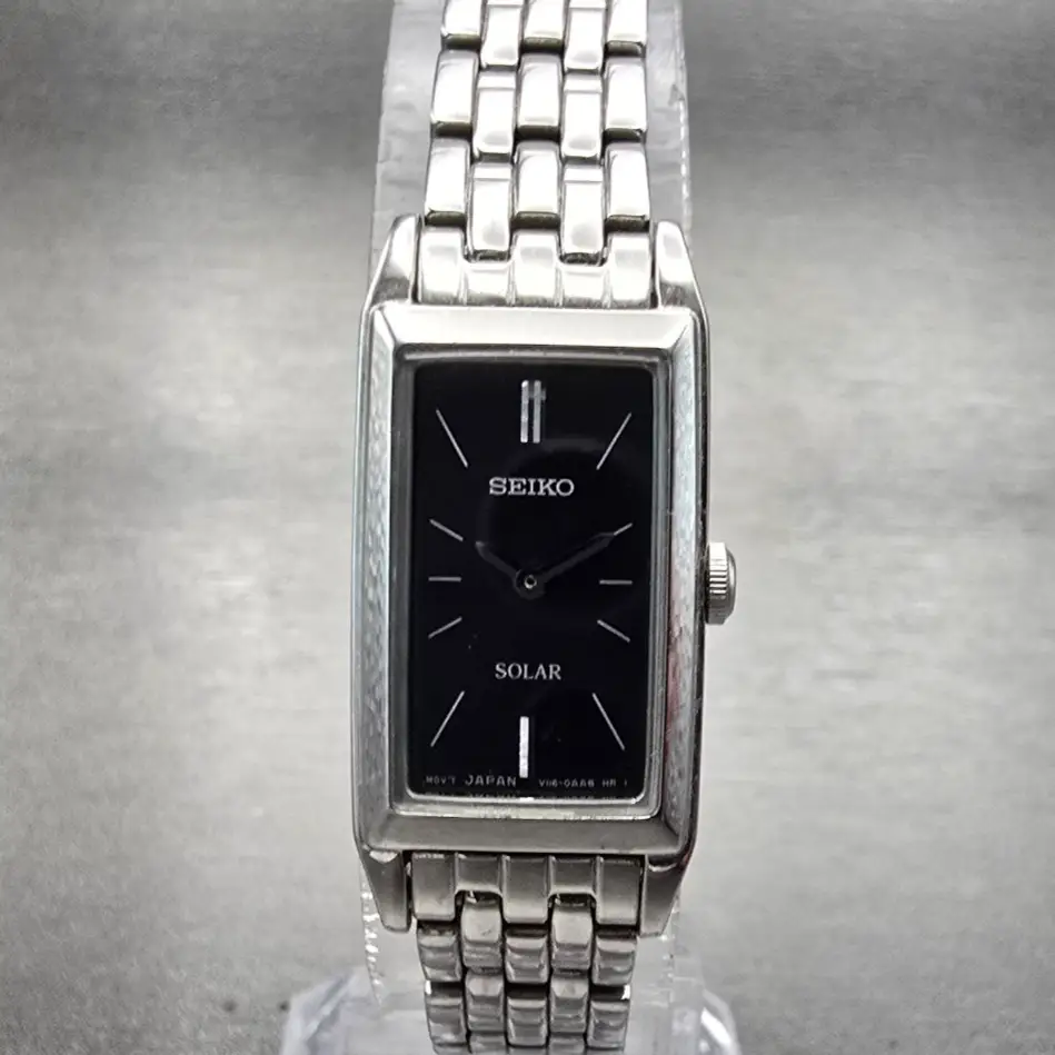 Seiko Solar Tank Watch Women 15mm Black Dial Silver Rectangle V116-0AA0 Works0
