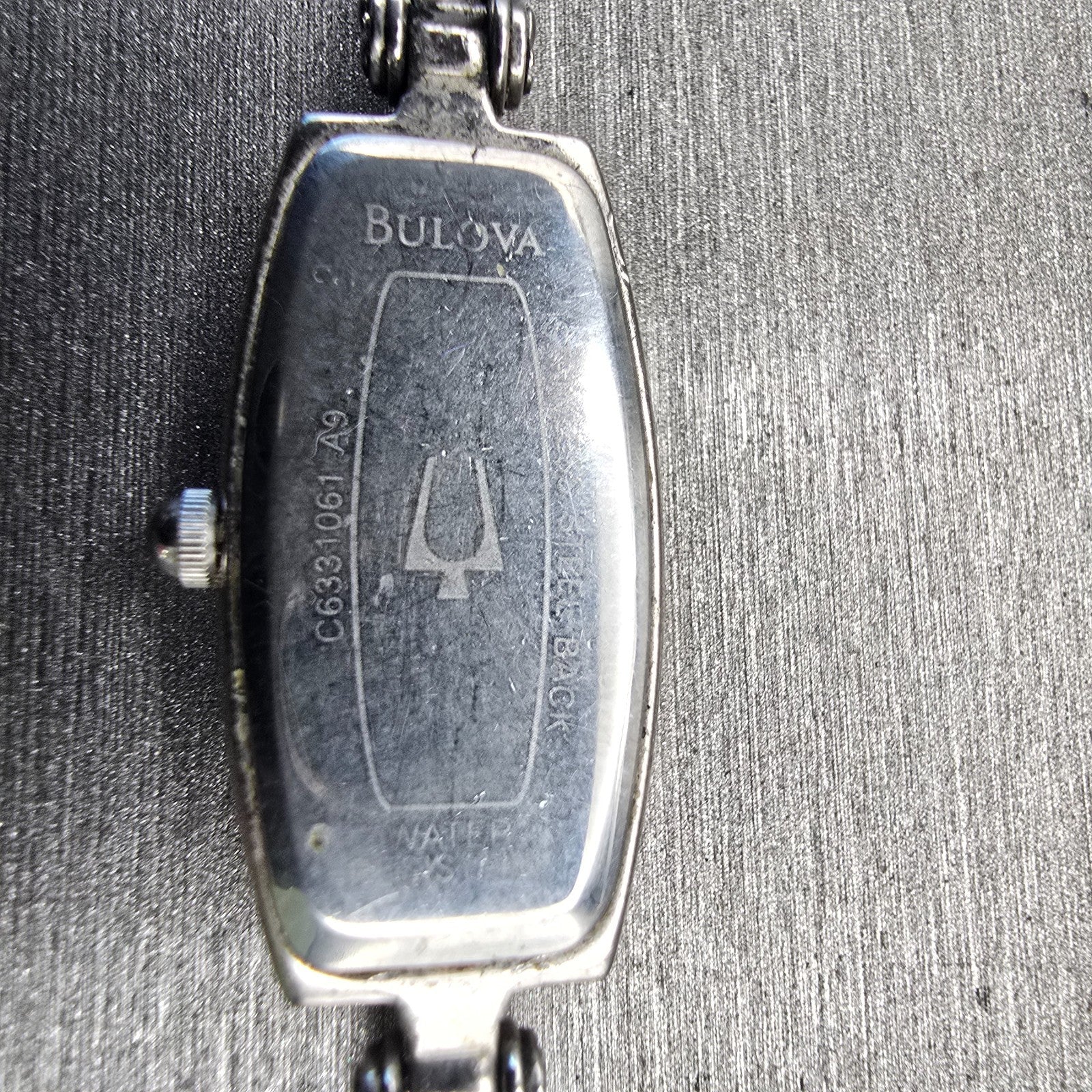 Bulova Watch Women 14mm Black Dial Silver Tone Gemmed Oval 96T15 New Battery9