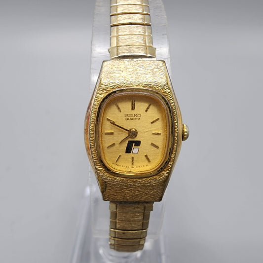 Vintage Seiko Watch Women Gold Tone Gold Dial 12mm Rectangle 2P20-5259 New Batt