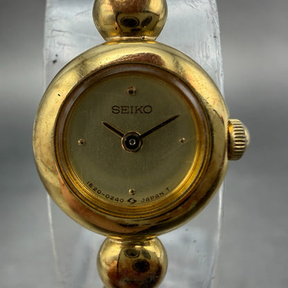 Seiko Watch Women 14mm Champagne Dial Gold Tone Round 1E20-0070 New Battery1