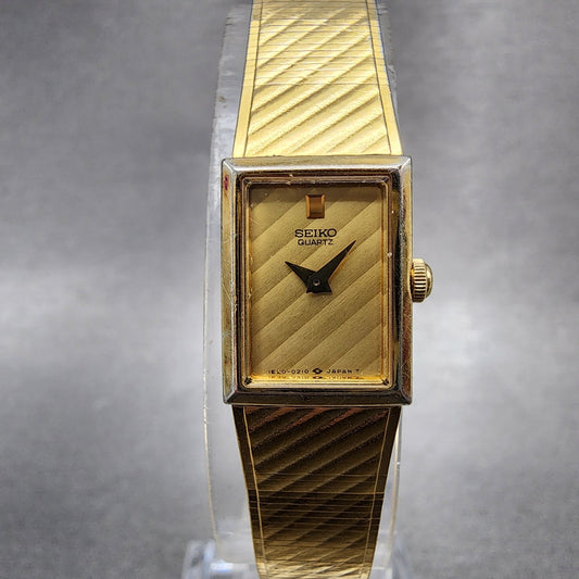 Seiko Tank Watch Women 12mm Gold Dial Gold Tone 1E205109 Rectangle New Battery0