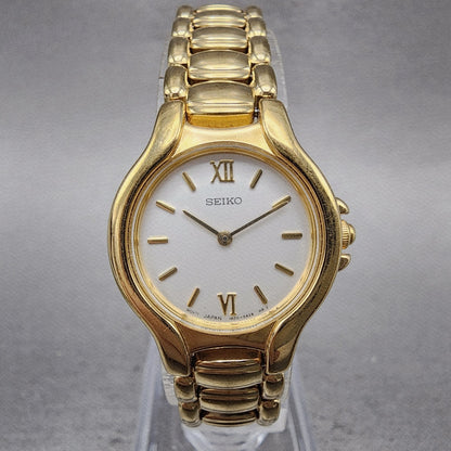 Seiko Watch Women 23mm Silver Dial Gold Tone Round 1n001f00 New Battery0